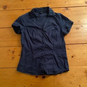 Navy blue short sleeve shirt.
